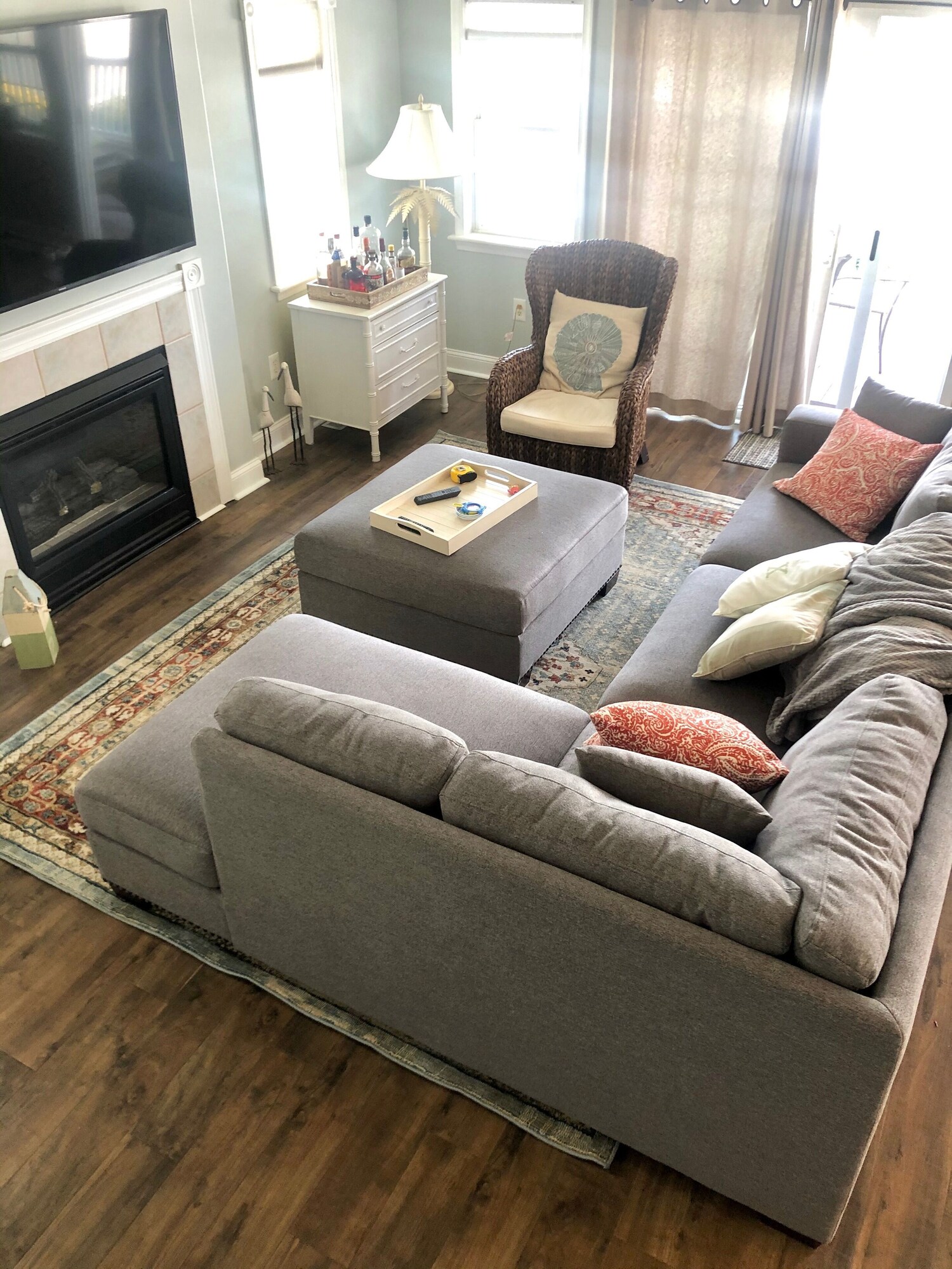 Living room with fireplace and deck access