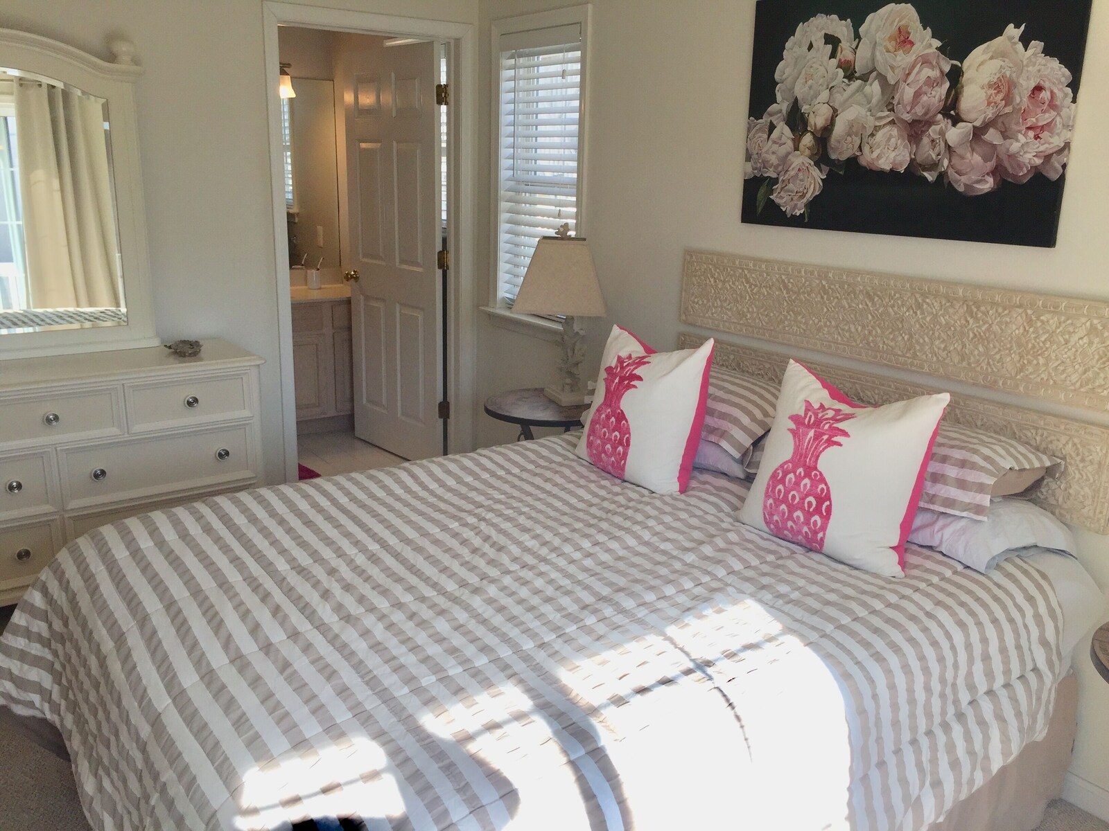 Queen bedroom with bright natural light